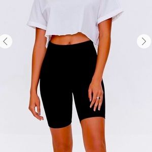 Black biker shorts and cheetah one piece for sale